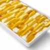 Fresh mango yoghurt tray from Top Fruit Market Greenacre Sydney with creamy yoghurt and sliced ripe mango.